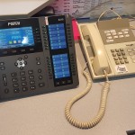 School reception phone and paging handset upgraded into one easy to use product